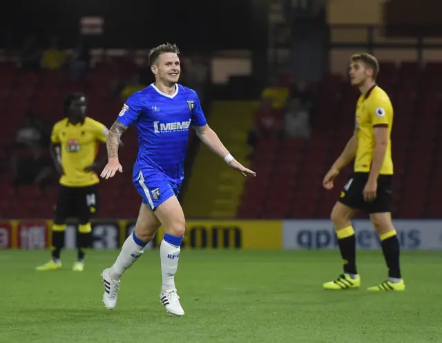 Gillingham's Mark Byrne celebrates his goal