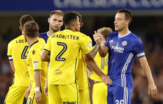 Chelsea's John Terry shakes hands with Bristol Rovers' Daniel Leadbitter