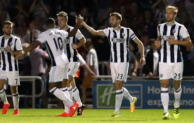 Gareth McAuley celebrates after scoring for West Brom