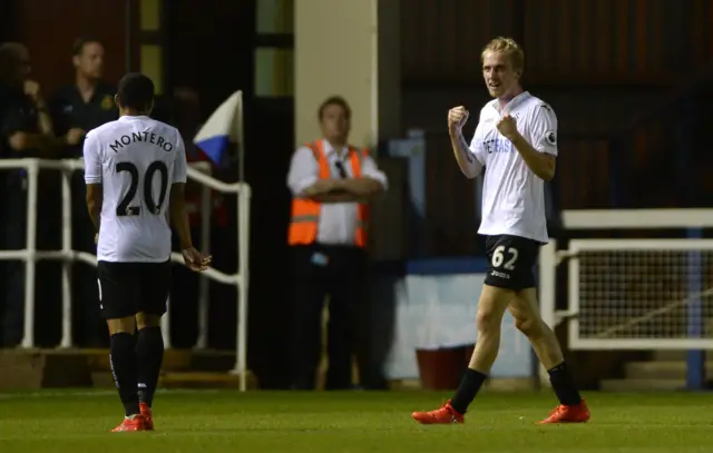 Swansea City's Ollie McBurnie celebrates scoring their third goal