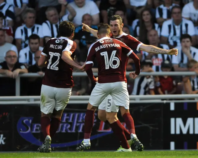 Northampton's Zander Diamond celebrates after scoring the game's opening goal