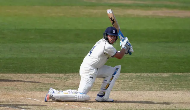 Ian Bell drives against Surrey in the County Championship