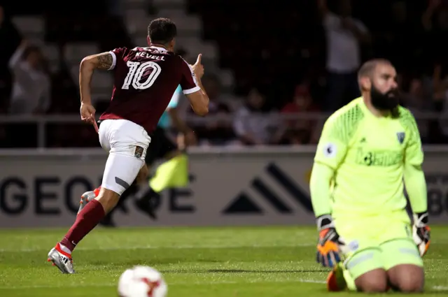 Alex Revell of Northampton Town celebrates scoring their second goal