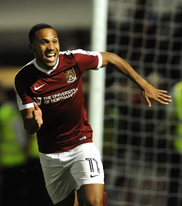 Gorre celebrates after scoring the winning penalty