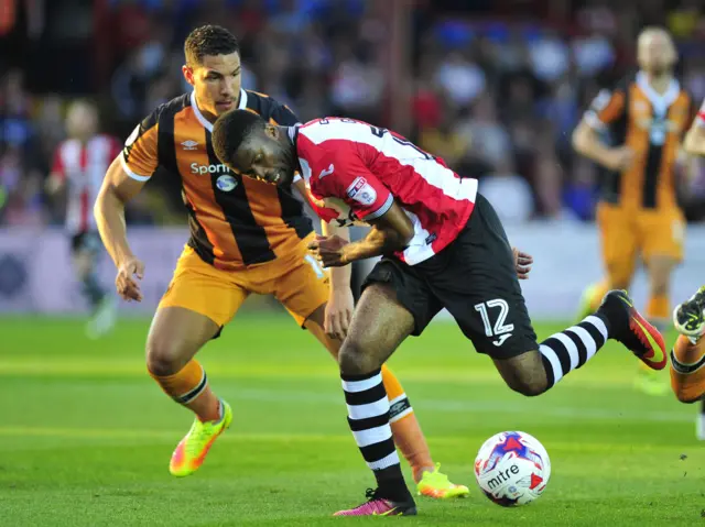 Exeter City's Joel Grant and Hull City's Jake Livermore