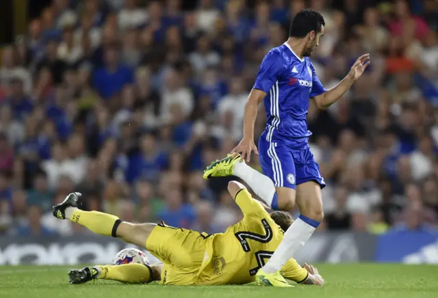 Stuart Sinclair of Bristol Rovers is fouled by Chelsea's Pedro