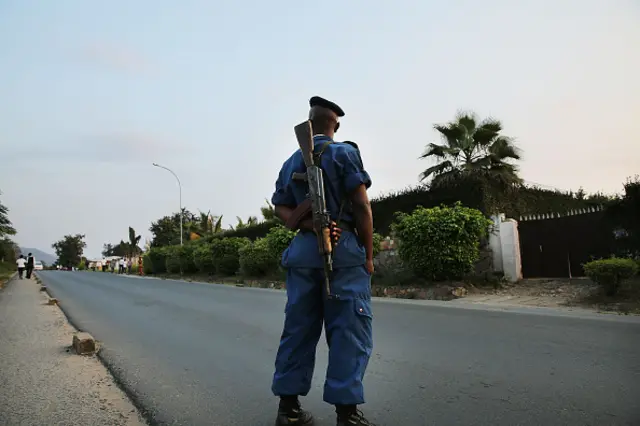 Police check cars for weapons on the outskirts of an opposition neighborhood on June 28, 2015 in Bujumbura, Burundi.