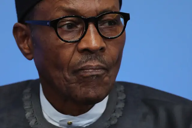 Nigerian President Muhammadu Buhari listens as British Prime Minister Cameron opens the international anti-corruption summit on May 12, 2016 in London, England.