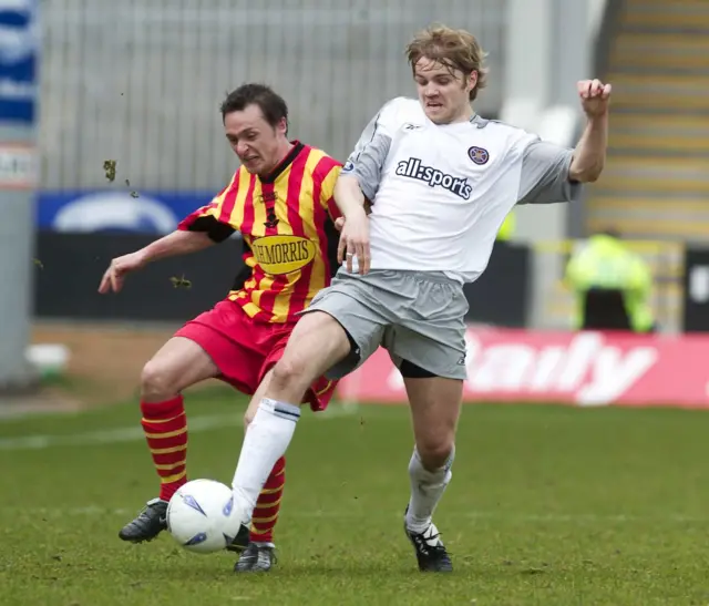 April 2004: Robbie Neilson nicks in ahead of Partick Thistle's Jamie Mitchell in a Scottish Premier League game