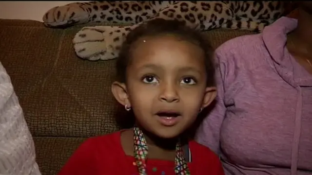 SOKO FEYISA speaks to the camera from inside the family home