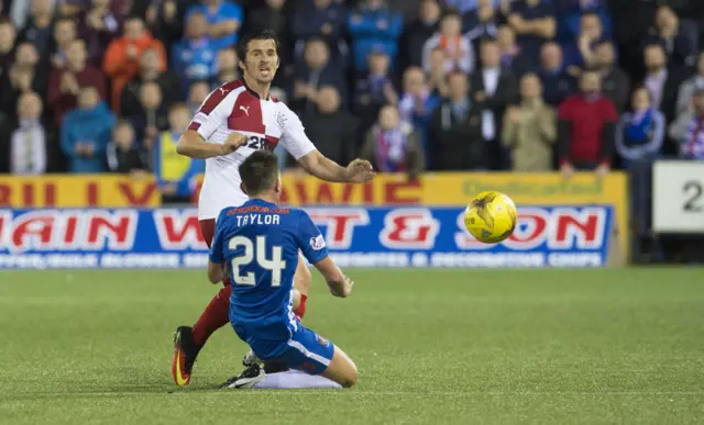 Greg Taylor tackles Joey Barton