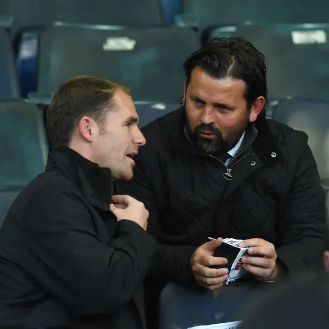 Partick Thistle manager Alan Archibald and Dundee counterpart Paul Hartley are watching the match at Rugby Park.