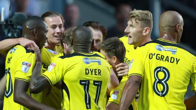 Burton players celebrate