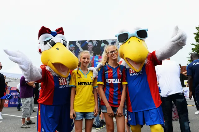 Crystal Palace fans with the clubs mascot