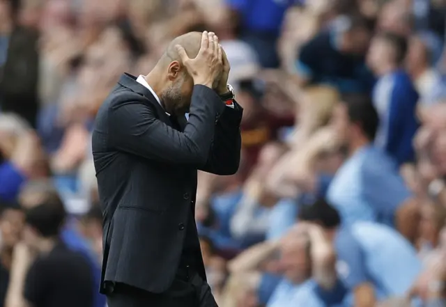 Pep Guardiola puts his head in his hands after De Bruyne's miss