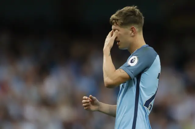 Man City's John Stones picks up an eye injury