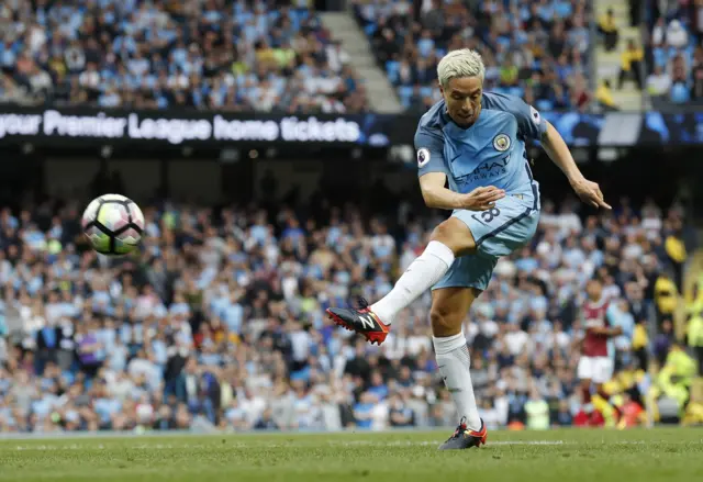 Manchester City's Samir Nasri shoots on goal