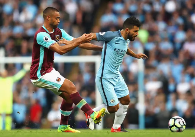 West Ham's Winston Reid tries to stop Sergio Aguero