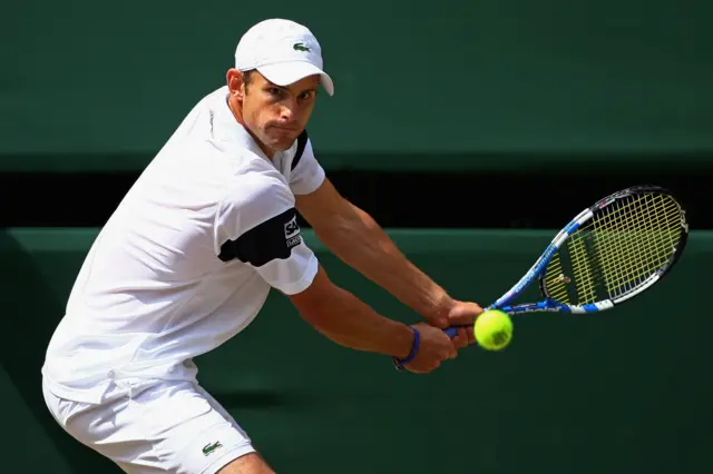 Andy Roddick playing against Roger Federer in the 2009 Wimbledon men's singles final.