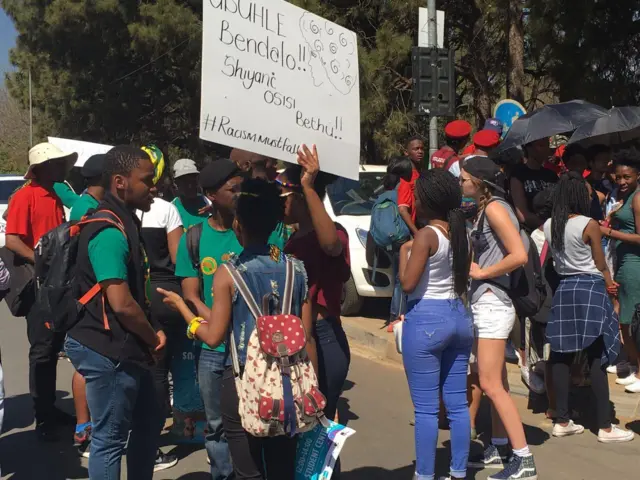 People protesting outside Pretoria Girls High School in South Africa