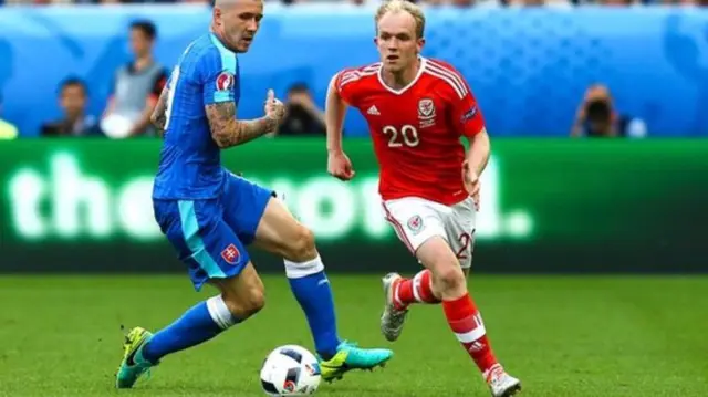 Jonny Williams in action for Wales