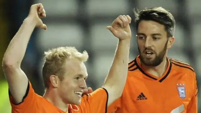 Jonny Williams celebrating with colleague