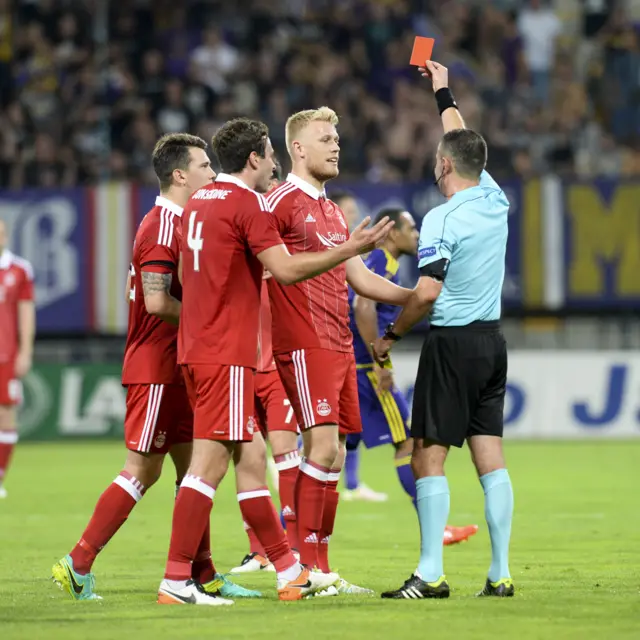 Jayden Stockley is shown a red card after picking up two yellow cards in quick succession.