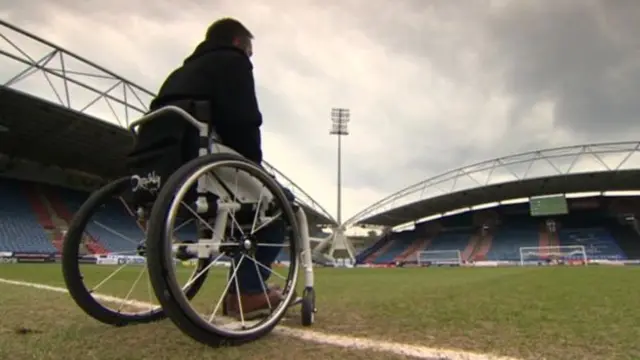 Wheelchair at football ground