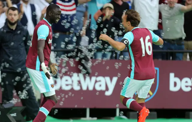 Cheikhou Kouyate is congratulated after scoring the first ever goal at London Stadium.