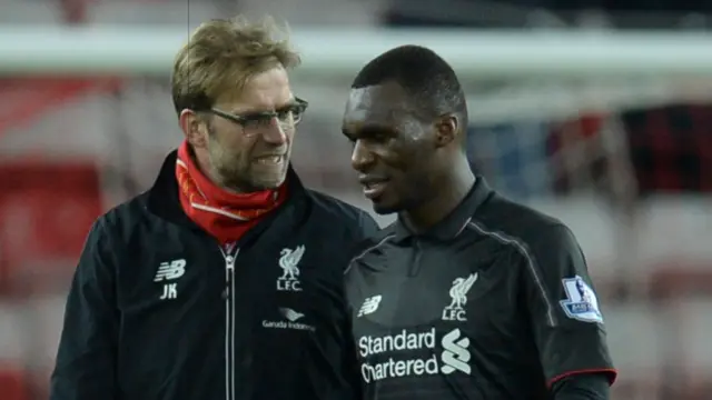 Liverpool manager Jurgen Klopp (left) and striker Christian Benteke