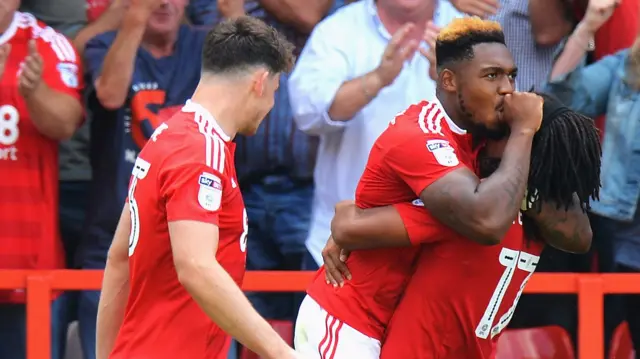 Assombalonga celebrates