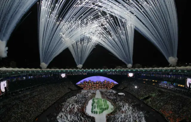 Olympic rings formed by fireworks