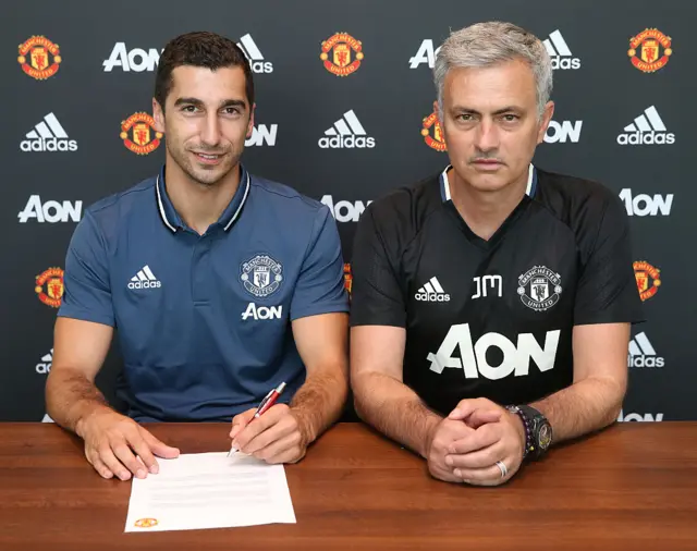 Henrikh Mkhitaryan and Jose Mourinho