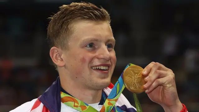 Adam Peaty with gold medal