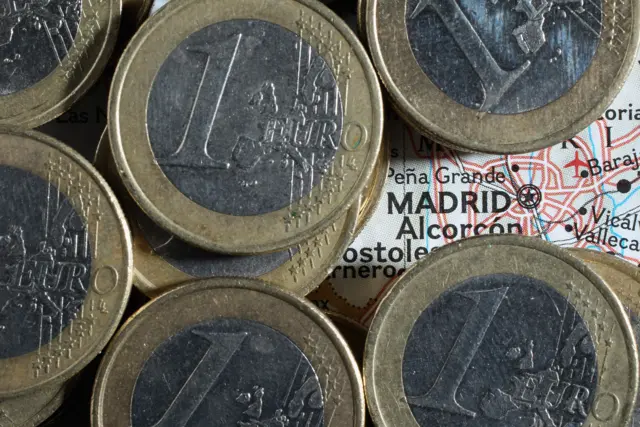 Euro coins on map of Spain