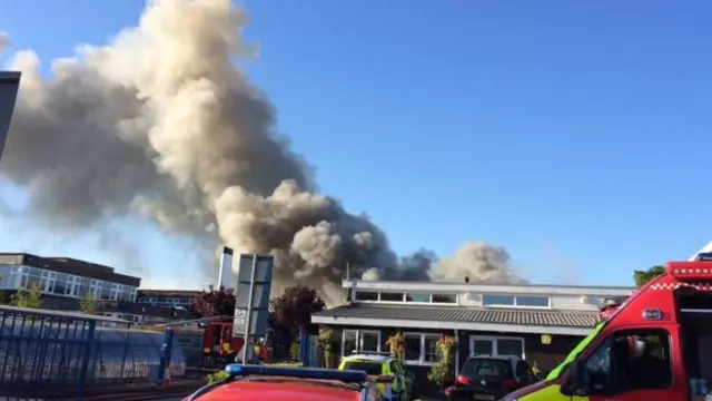 Plume of smoke rising from Cecil Jones Academy