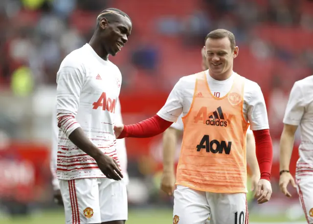 Pogba and Rooney warm up at Old Trafford