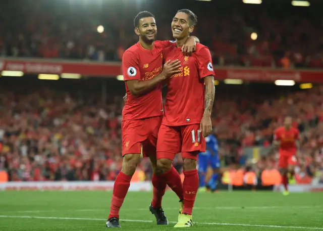 Roberto Firmino celebrates with Kevin Stewart