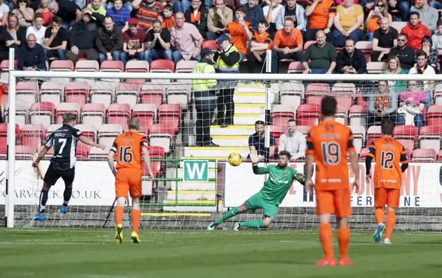 Cammy Bell saves Gavin Reilly's penalty for Dunfermline