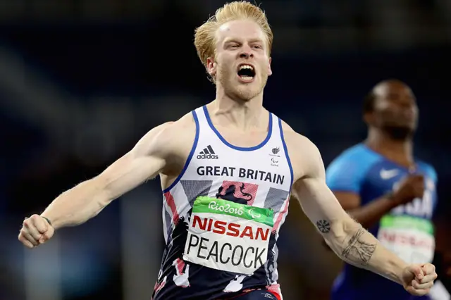 Jonnie Peacock celebrates winning the T44 100m title at the Rio Paralympics