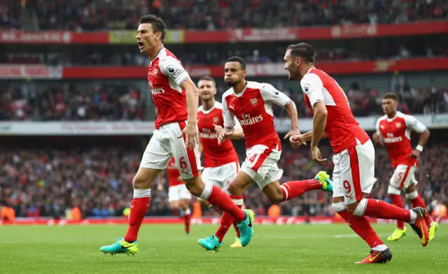 Laurent Koscielny of Arsenal celebrates