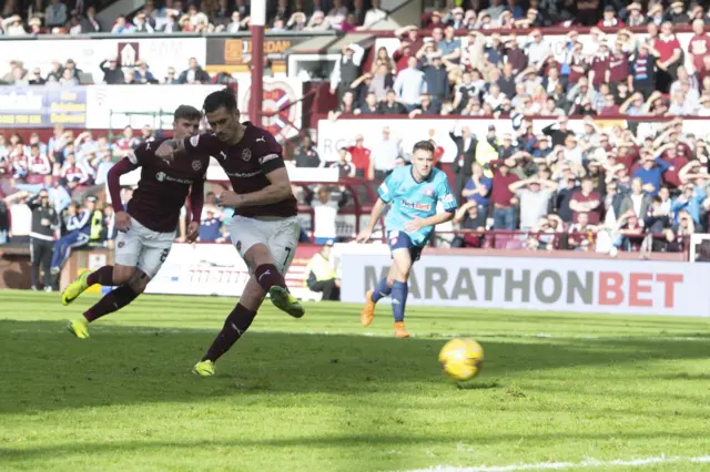 Jamie Walker slots home a penalty for Hearts to make it 2-1