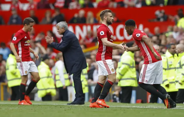 Martial comes on for Shaw