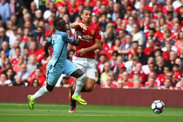 Bacary Sagna of Manchester City and Zlatan Ibrahimovic of Manchester United