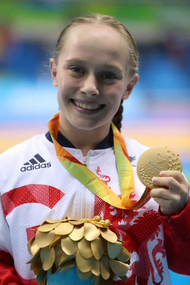 Ellie Robinson celebrates winning the women's 50m butterfly S6 at the Rio Paralympics