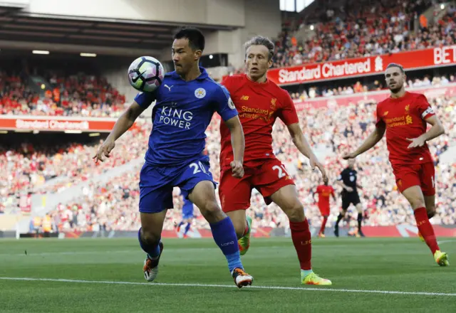 Lucas in action with Leicester's Shinji Okazaki