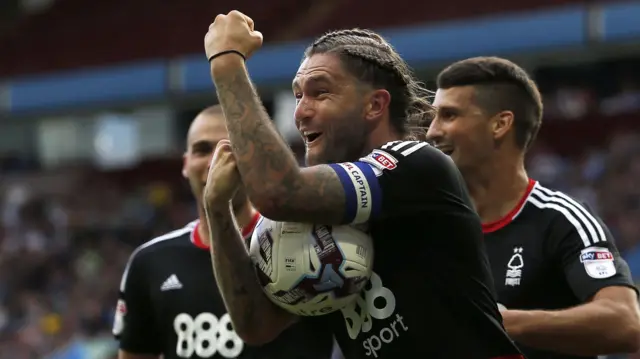 Henry Lansbury celebrates his goal for Nottingham Forest