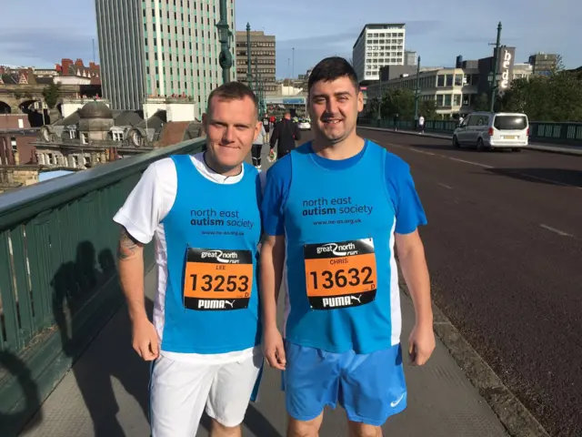 Two runners on the Tyne Bridge