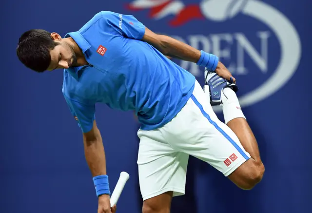 Novak Djokovic of Serbia stretches