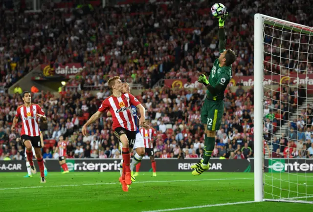 Everton's Maarten Stekelenburg tips the ball over the bar